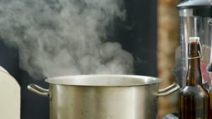 depositphotos_200634868-stock-video-saucepan-with-steam-the-smoke