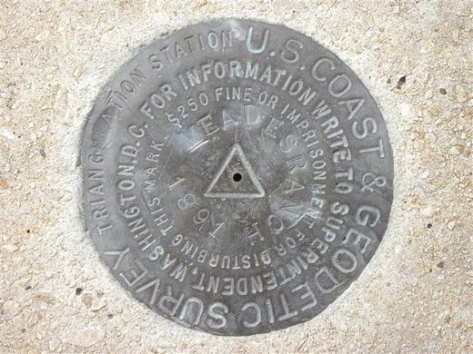 Bronze disc geodetic marker Meades Ranch